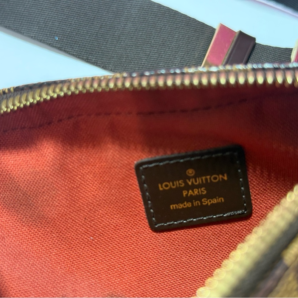 Louis Vuitton Bag with Red Lining and Gold Accents - Picture 6 of 9